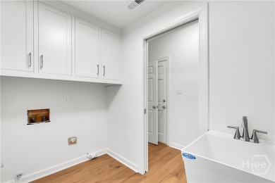 Fresh, top-to-bottom renovation in The Landings! This gorgeous on The Landings Club - Oakridge in Georgia - for sale on GolfHomes.com, golf home, golf lot