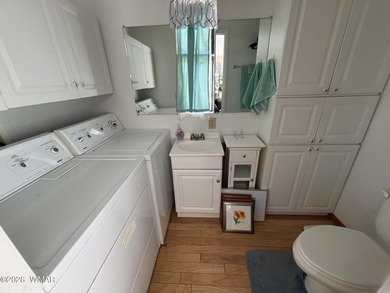 Come see this Beautiful home backing the peaceful Pond and on Juniper Ridge R.V. Golf Resort in Arizona - for sale on GolfHomes.com, golf home, golf lot