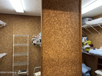 Excellent location on a cul-de-sac in Carolina Shores. Backs up on Carolina Shores Golf Course in North Carolina - for sale on GolfHomes.com, golf home, golf lot