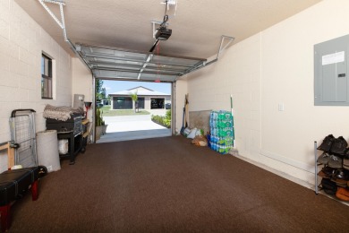 Check out This amazing CBS home build in 2021 - Double drive way on Spanish Lakes I in Florida - for sale on GolfHomes.com, golf home, golf lot
