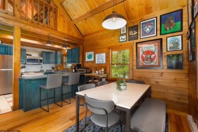 Escape to 'Rustic Refuge', a charming LOG CHALET nestled within on Alpine Lake Resort in West Virginia - for sale on GolfHomes.com, golf home, golf lot