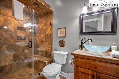 Experience mountain living at its finest in this fully renovated on Sugar Mountain Golf Course in North Carolina - for sale on GolfHomes.com, golf home, golf lot