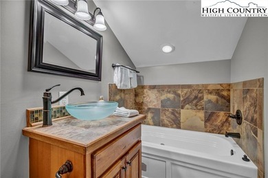 Experience mountain living at its finest in this fully renovated on Sugar Mountain Golf Course in North Carolina - for sale on GolfHomes.com, golf home, golf lot