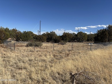Great corner lot with Septic installed, fenced, Lot includes on Silver Creek Golf Club in Arizona - for sale on GolfHomes.com, golf home, golf lot