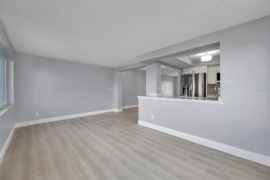 Beautifully renovated home in the golf course community of on Mainlands Golf Club in Florida - for sale on GolfHomes.com, golf home, golf lot