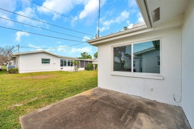 Beautifully renovated home in the golf course community of on Mainlands Golf Club in Florida - for sale on GolfHomes.com, golf home, golf lot