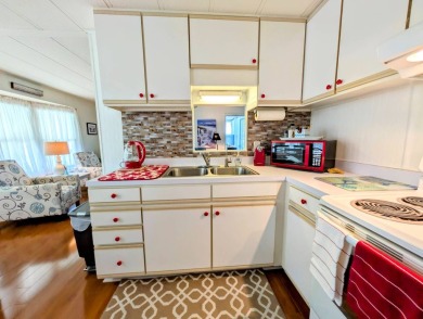 Location, Location, Location!  This home has great curb appeal on Grasslands Golf and Country Club in Florida - for sale on GolfHomes.com, golf home, golf lot