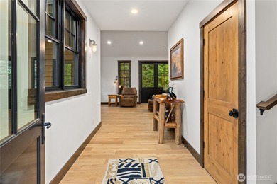 Tucked into a quiet corner of Suncadia, 140 Big Rock Lane offers on Suncadia Resort in Washington - for sale on GolfHomes.com, golf home, golf lot