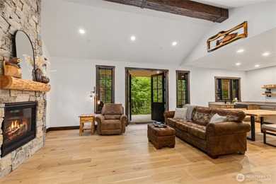 Tucked into a quiet corner of Suncadia, 140 Big Rock Lane offers on Suncadia Resort in Washington - for sale on GolfHomes.com, golf home, golf lot