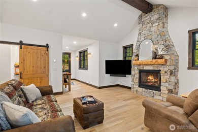 Tucked into a quiet corner of Suncadia, 140 Big Rock Lane offers on Suncadia Resort in Washington - for sale on GolfHomes.com, golf home, golf lot