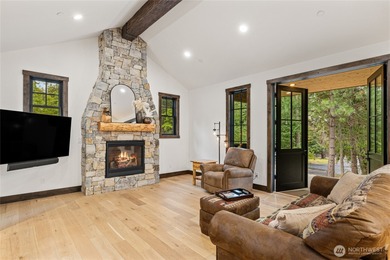 Tucked into a quiet corner of Suncadia, 140 Big Rock Lane offers on Suncadia Resort in Washington - for sale on GolfHomes.com, golf home, golf lot