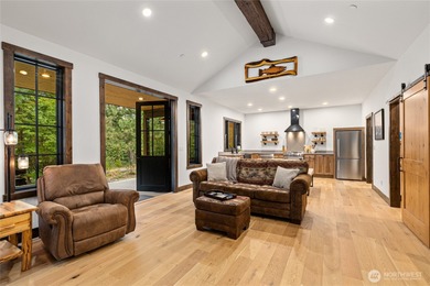 Tucked into a quiet corner of Suncadia, 140 Big Rock Lane offers on Suncadia Resort in Washington - for sale on GolfHomes.com, golf home, golf lot