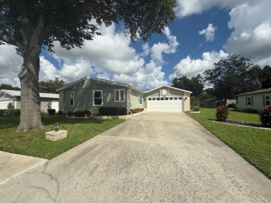 This beautifully renovated 2-bedroom, 2-bathroom, Palm Harbor on Del Tura Golf and Country Club in Florida - for sale on GolfHomes.com, golf home, golf lot