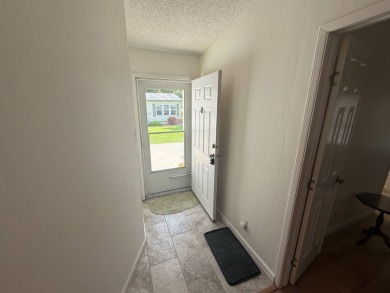 This beautifully renovated 2-bedroom, 2-bathroom, Palm Harbor on Del Tura Golf and Country Club in Florida - for sale on GolfHomes.com, golf home, golf lot