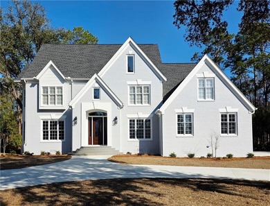 Perfectly positioned on the 18th tee box of the prestigious on Okefenokee Country Club in Georgia - for sale on GolfHomes.com, golf home, golf lot