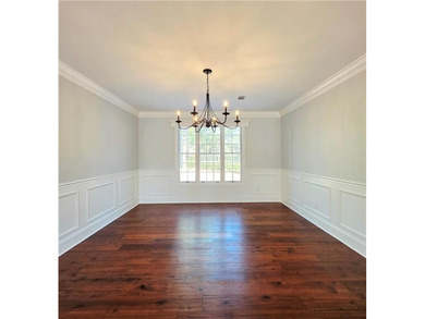 Perfectly positioned on the 18th tee box of the prestigious on Okefenokee Country Club in Georgia - for sale on GolfHomes.com, golf home, golf lot