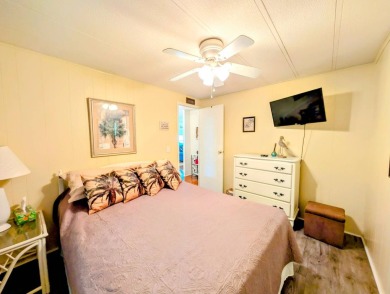 Location, Location, Location!  This home has great curb appeal on Grasslands Golf and Country Club in Florida - for sale on GolfHomes.com, golf home, golf lot