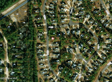 Build your dream home on this exceptional high-and-dry homesite on Sea Trail Golf Resort in North Carolina - for sale on GolfHomes.com, golf home, golf lot