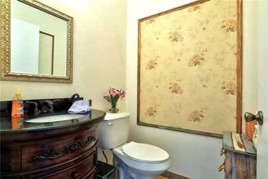 Charming first-floor condo with golf and green space views plus on The American Golf Club in Florida - for sale on GolfHomes.com, golf home, golf lot