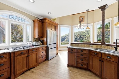 This stunning mountain retreat combines timeless craftsman on Big Canoe Golf Club - Cherokee in Georgia - for sale on GolfHomes.com, golf home, golf lot