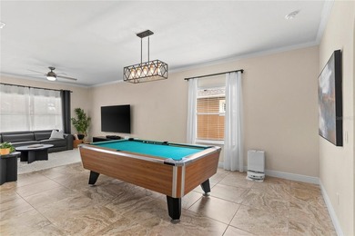 Beautiful Water-View Pool Home in Gated Golf Course Community - on Stoneybrook West in Florida - for sale on GolfHomes.com, golf home, golf lot