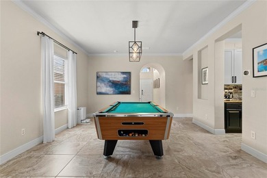 Beautiful Water-View Pool Home in Gated Golf Course Community - on Stoneybrook West in Florida - for sale on GolfHomes.com, golf home, golf lot