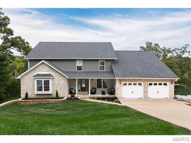 Not only will you get this spectacular home, but the lot next on Raintree Country Club in Missouri - for sale on GolfHomes.com, golf home, golf lot
