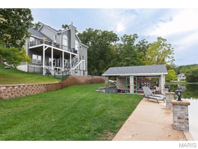 Not only will you get this spectacular home, but the lot next on Raintree Country Club in Missouri - for sale on GolfHomes.com, golf home, golf lot