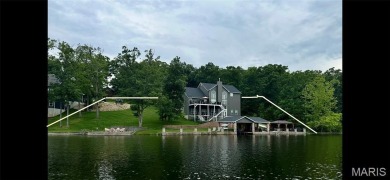 Not only will you get this spectacular home, but the lot next on Raintree Country Club in Missouri - for sale on GolfHomes.com, golf home, golf lot