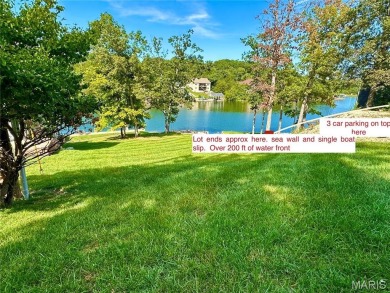 Not only will you get this spectacular home, but the lot next on Raintree Country Club in Missouri - for sale on GolfHomes.com, golf home, golf lot