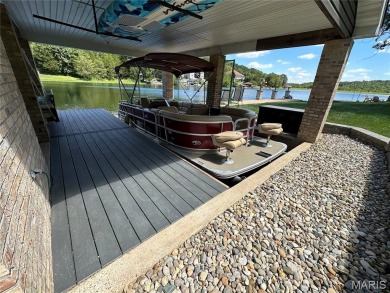 Not only will you get this spectacular home, but the lot next on Raintree Country Club in Missouri - for sale on GolfHomes.com, golf home, golf lot