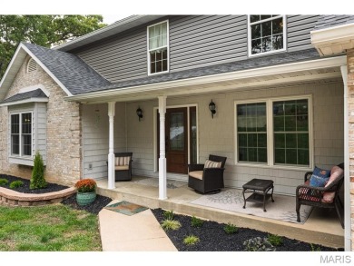 Not only will you get this spectacular home, but the lot next on Raintree Country Club in Missouri - for sale on GolfHomes.com, golf home, golf lot