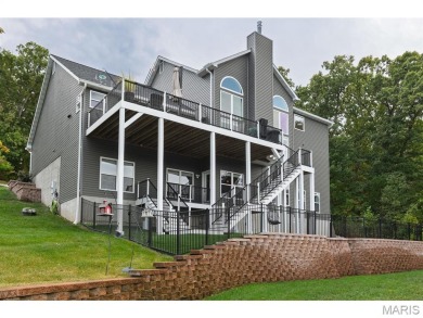 Not only will you get this spectacular home, but the lot next on Raintree Country Club in Missouri - for sale on GolfHomes.com, golf home, golf lot