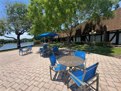 For Sale - Spacious 1 Bed / 1.5 Bath Condo in International on Inverrary Country Club in Florida - for sale on GolfHomes.com, golf home, golf lot
