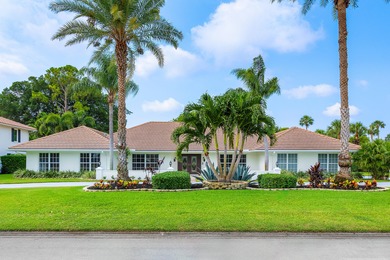 Discover comfortable luxury in this expansive single-story on Atlantis Golf Club in Florida - for sale on GolfHomes.com, golf home, golf lot