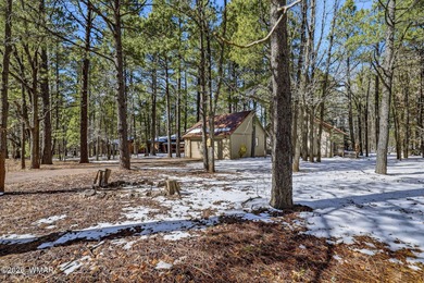 Cabin on the fairway of Pinetop Lakes Golf Course with access to on Pinetop Lakes Country Club in Arizona - for sale on GolfHomes.com, golf home, golf lot