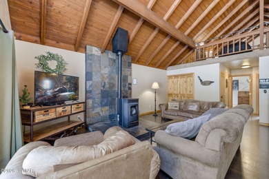 Cabin on the fairway of Pinetop Lakes Golf Course with access to on Pinetop Lakes Country Club in Arizona - for sale on GolfHomes.com, golf home, golf lot