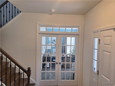 This stunning end-unit townhome in the Magnolia Green community on The Westham Golf Club At Magnolia Green in Virginia - for sale on GolfHomes.com, golf home, golf lot