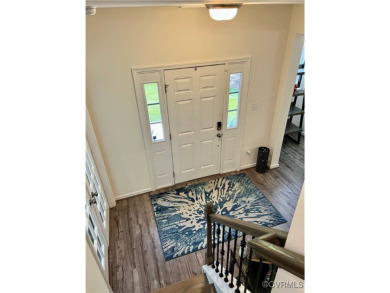 This stunning end-unit townhome in the Magnolia Green community on The Westham Golf Club At Magnolia Green in Virginia - for sale on GolfHomes.com, golf home, golf lot