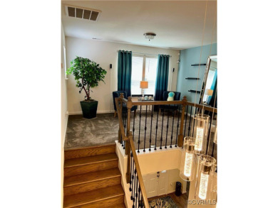 This stunning end-unit townhome in the Magnolia Green community on The Westham Golf Club At Magnolia Green in Virginia - for sale on GolfHomes.com, golf home, golf lot