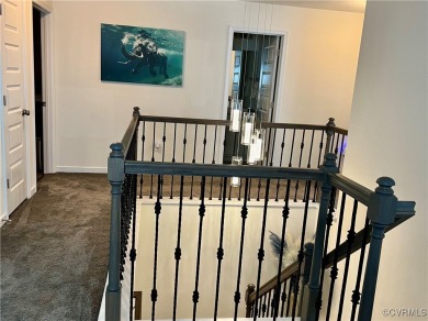 This stunning end-unit townhome in the Magnolia Green community on The Westham Golf Club At Magnolia Green in Virginia - for sale on GolfHomes.com, golf home, golf lot