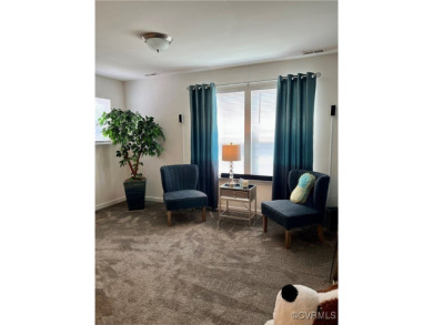 This stunning end-unit townhome in the Magnolia Green community on The Westham Golf Club At Magnolia Green in Virginia - for sale on GolfHomes.com, golf home, golf lot
