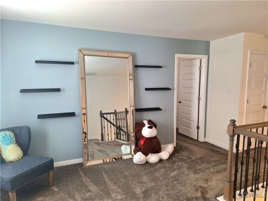 This stunning end-unit townhome in the Magnolia Green community on The Westham Golf Club At Magnolia Green in Virginia - for sale on GolfHomes.com, golf home, golf lot
