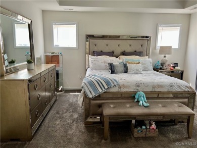 This stunning end-unit townhome in the Magnolia Green community on The Westham Golf Club At Magnolia Green in Virginia - for sale on GolfHomes.com, golf home, golf lot