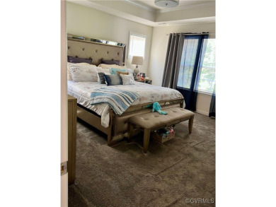 This stunning end-unit townhome in the Magnolia Green community on The Westham Golf Club At Magnolia Green in Virginia - for sale on GolfHomes.com, golf home, golf lot