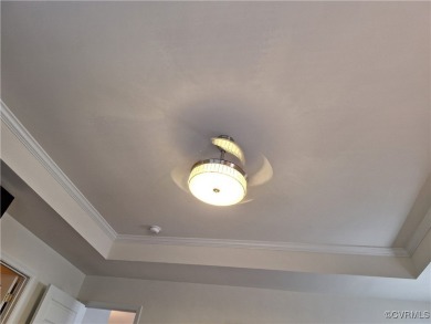 This stunning end-unit townhome in the Magnolia Green community on The Westham Golf Club At Magnolia Green in Virginia - for sale on GolfHomes.com, golf home, golf lot