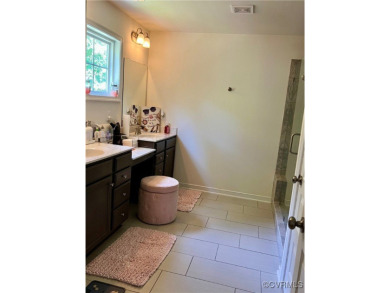 This stunning end-unit townhome in the Magnolia Green community on The Westham Golf Club At Magnolia Green in Virginia - for sale on GolfHomes.com, golf home, golf lot