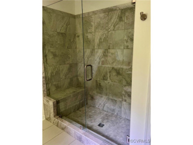 This stunning end-unit townhome in the Magnolia Green community on The Westham Golf Club At Magnolia Green in Virginia - for sale on GolfHomes.com, golf home, golf lot