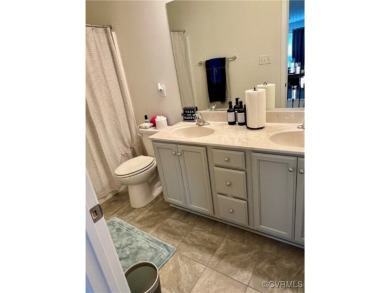 This stunning end-unit townhome in the Magnolia Green community on The Westham Golf Club At Magnolia Green in Virginia - for sale on GolfHomes.com, golf home, golf lot