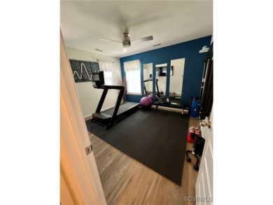 This stunning end-unit townhome in the Magnolia Green community on The Westham Golf Club At Magnolia Green in Virginia - for sale on GolfHomes.com, golf home, golf lot